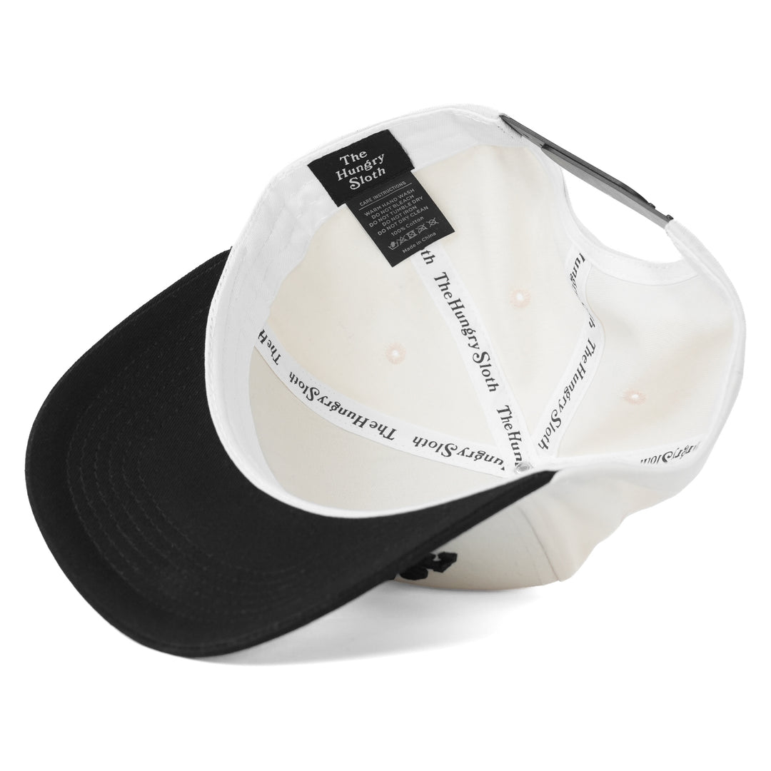 black and off-white snapback hat with the hungry sloth branding underneath