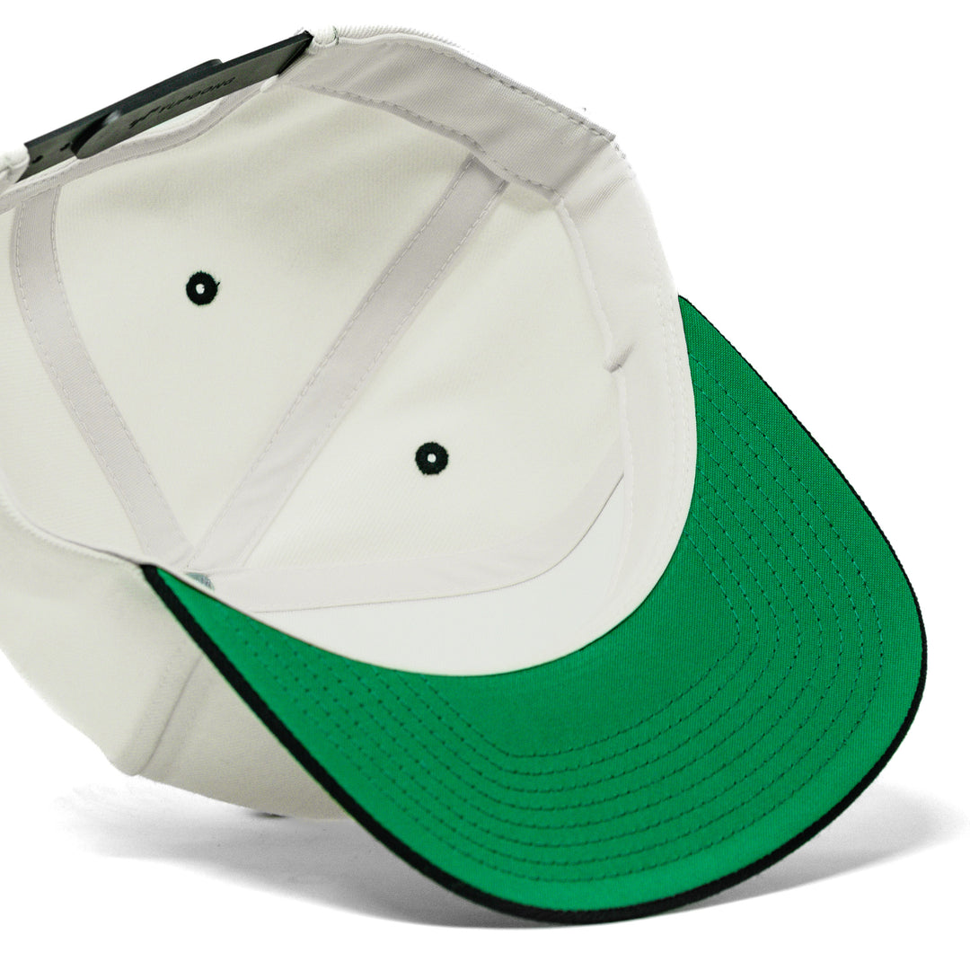 natural white snapback hat with green under brim