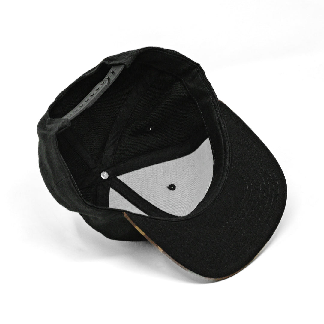 black snapback hat from underneath