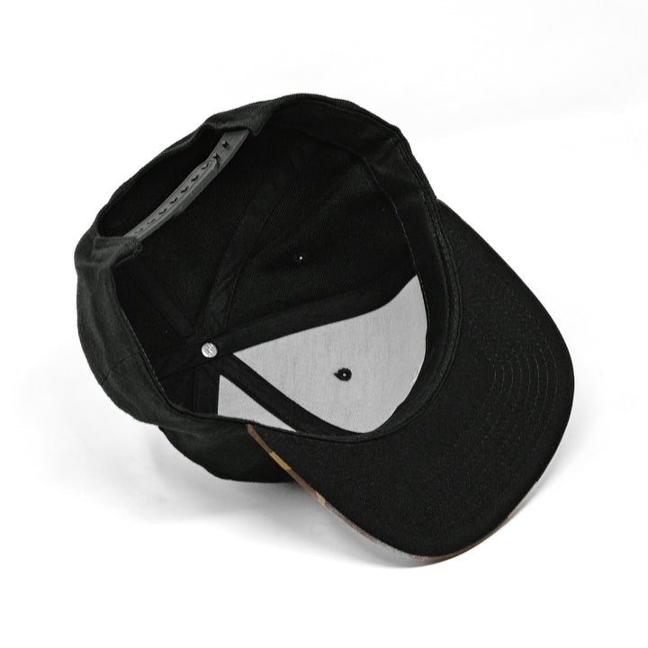 black snapback hat from underneath