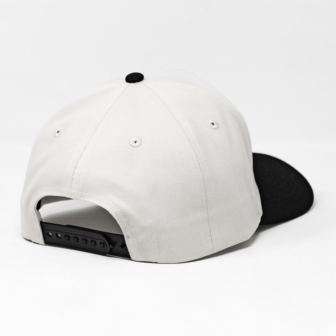 white and black snapback hat