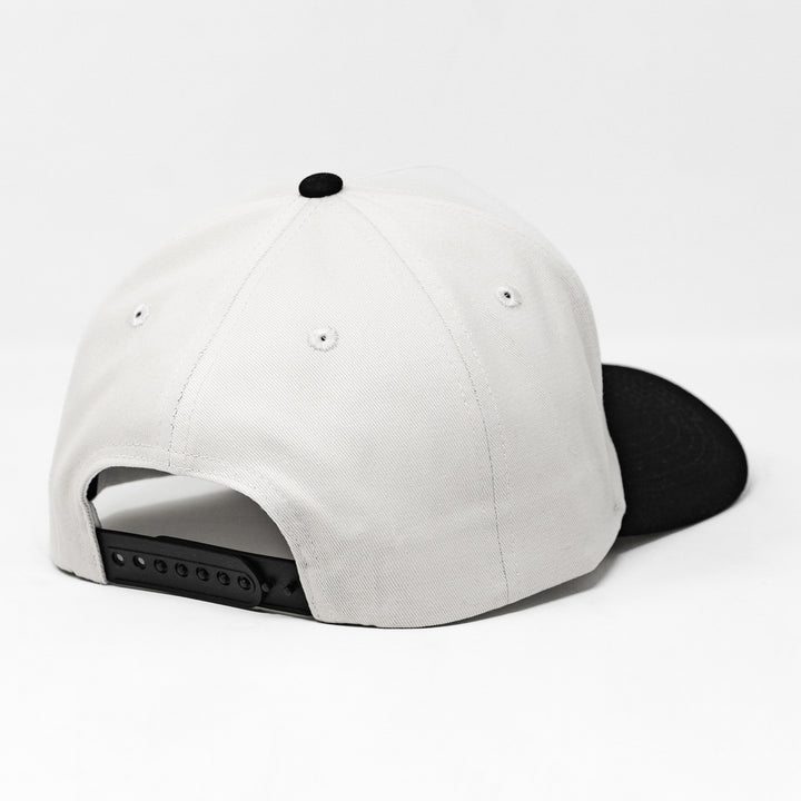 white and black snapback hat