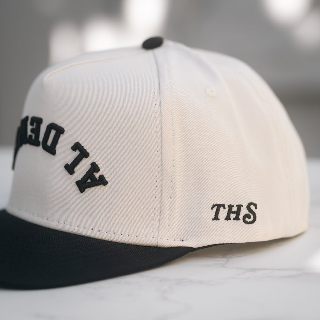 al dente upside down snapback hat with THS logo on the side