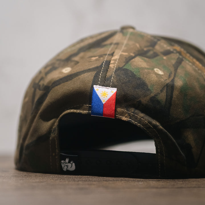 snapback hat tree camo with Philippines flag label on the back