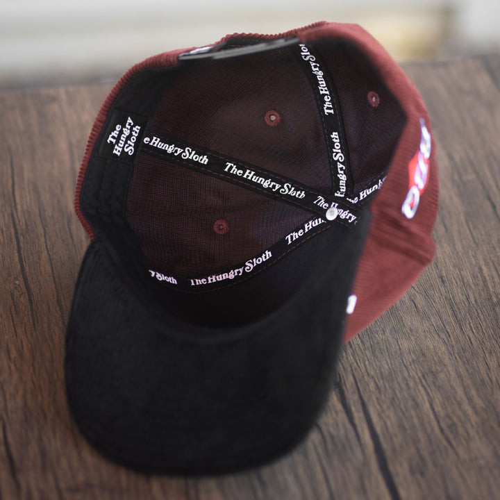 barbecue upside down snapback hat with the hungry sloth branding underneath