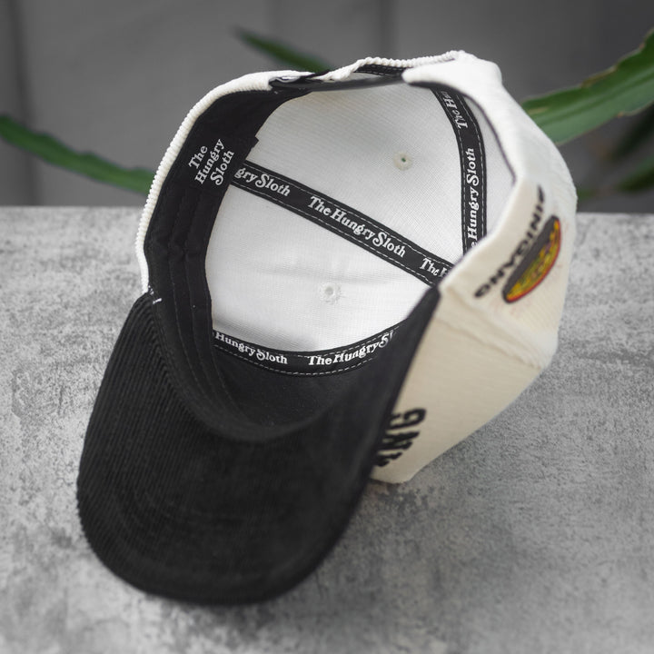sinigang upside down snapback hat with the hungry sloth branding underneath