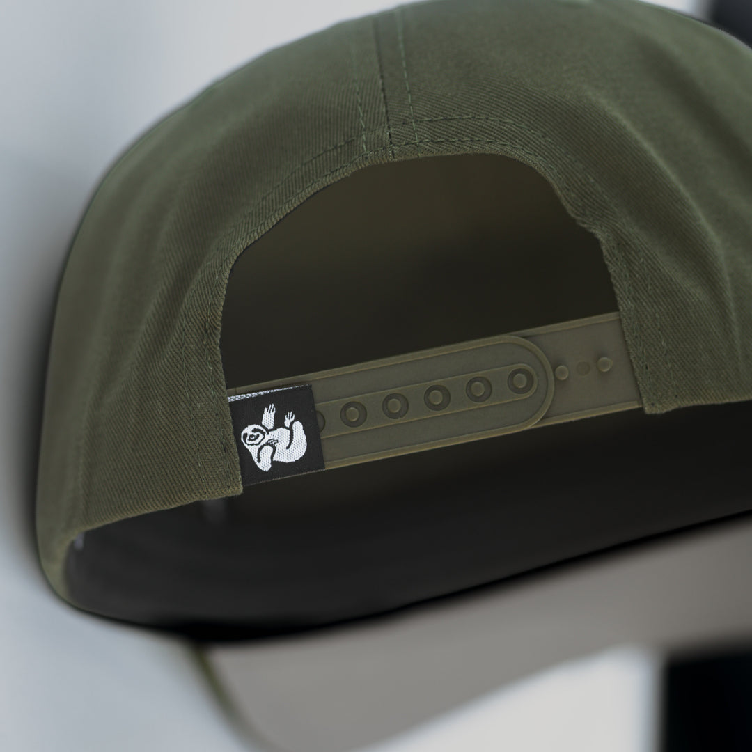 snapback hat olive green with the hungry sloth label on the back