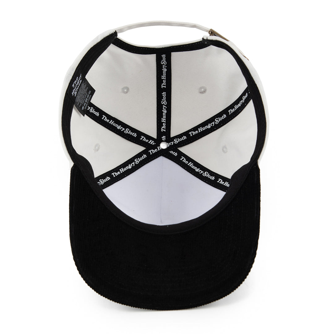 black and white cap with the hungry sloth branding underneath