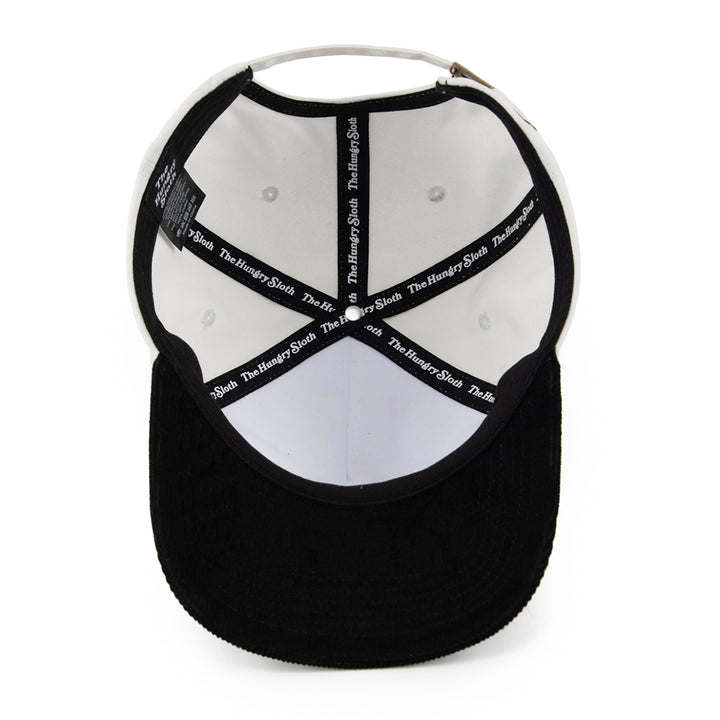 black and white cap with the hungry sloth branding underneath