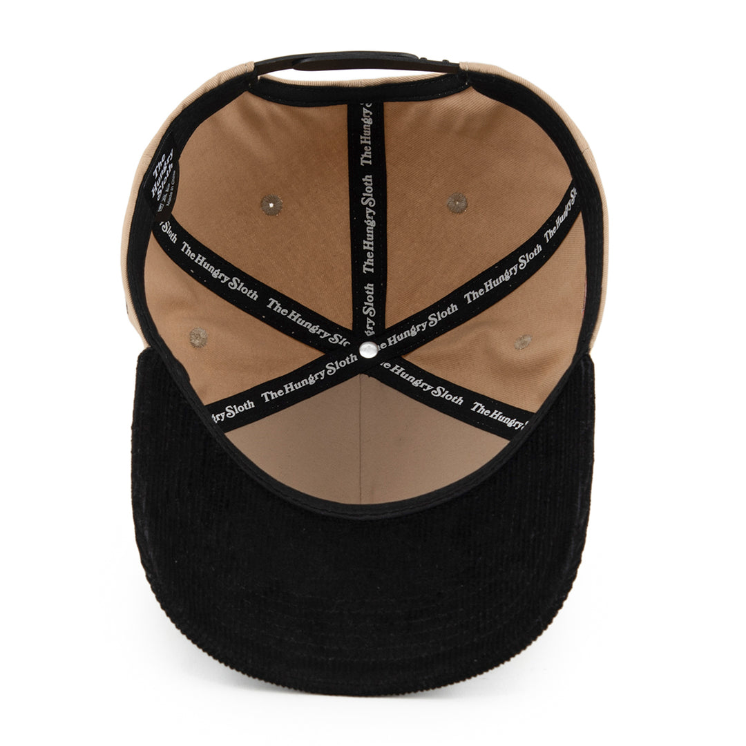 khaki and black snapback hat with the hungry sloth branding on the bottom