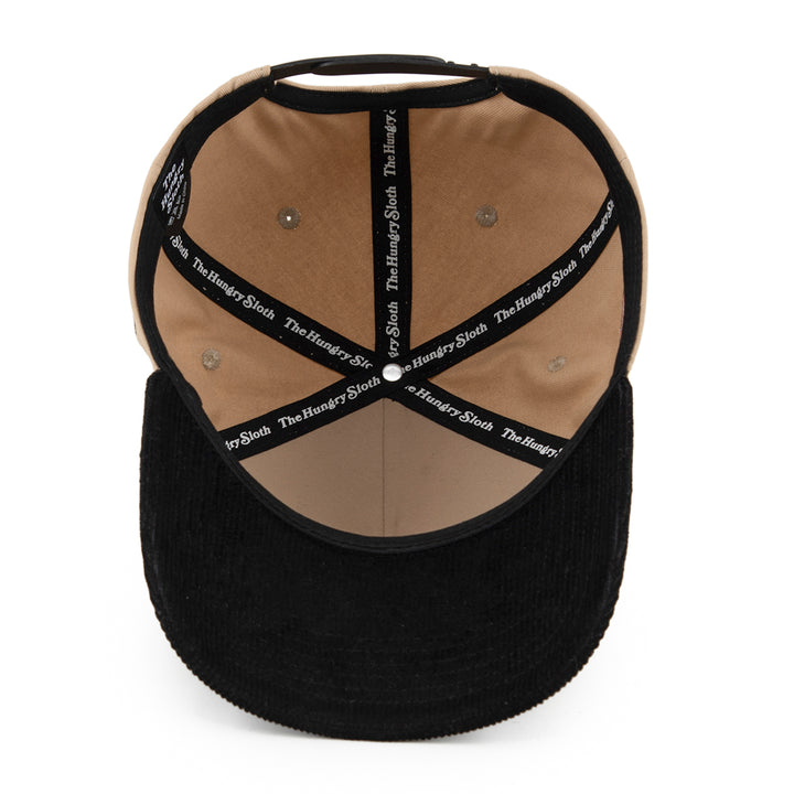 khaki and black snapback hat with the hungry sloth branding on the bottom