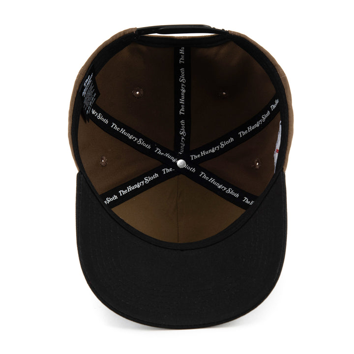 bottom of brown snapback hat with the hungry sloth branding