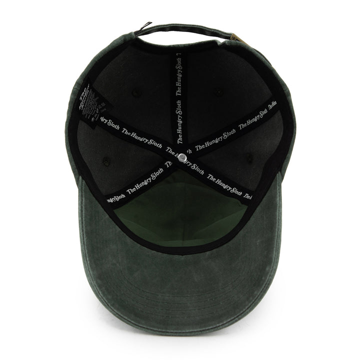 vintage olive dad hat with the hungry sloth branding underneath