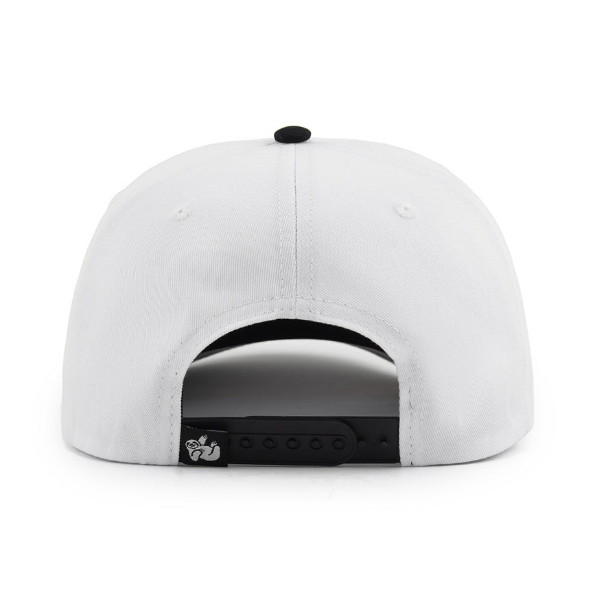 The back view of a white structured snapback cap with a black button on top and a black adjustable closure strap.