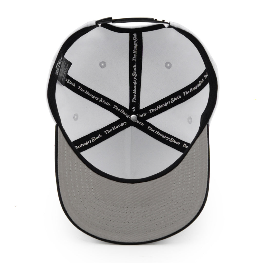 white snapback hat with grey undervisor and the hungry sloth branding underneath