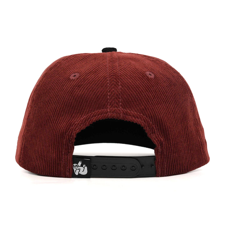 maroon corduroy snapback hat with the hungry sloth label on the back