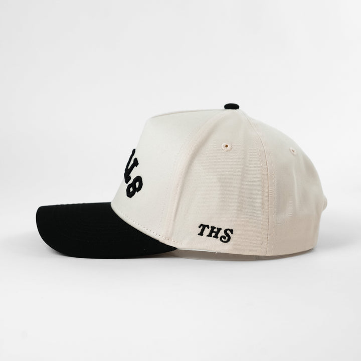 upside down steak hat with ths logo on the side