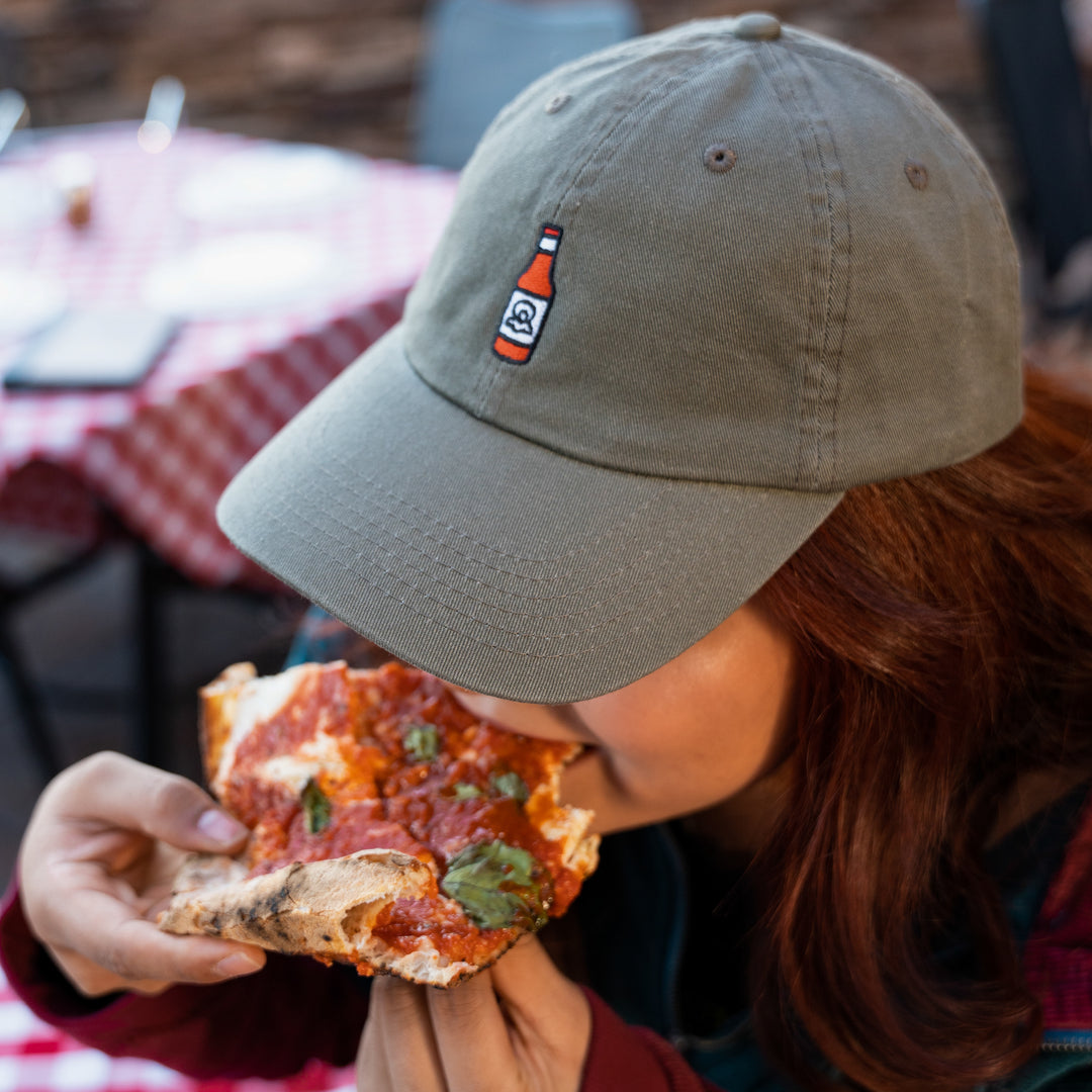 hot sauce hat with pizza